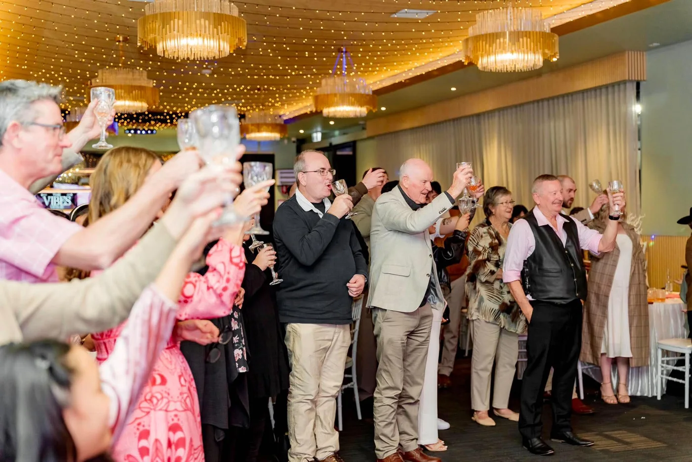 Guests celebrating together at The Vibes Venue
